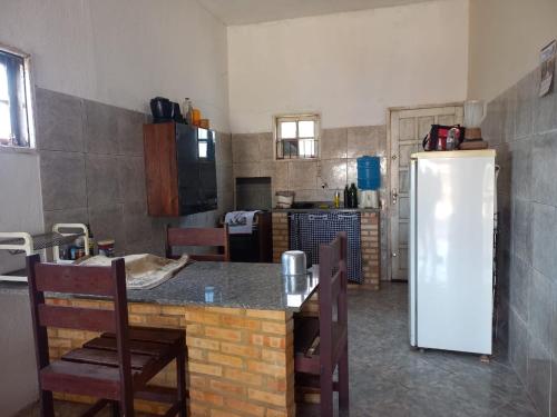 A cozinha ou cozinha compacta de Casa de praia em Grussaí/RJ