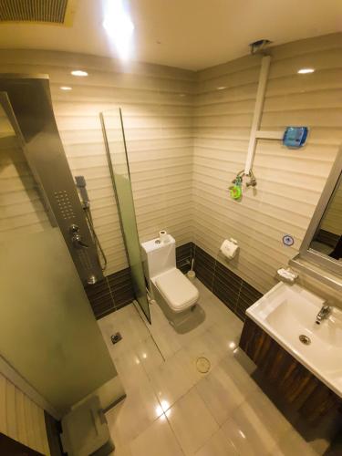 Koupelna v ubytování Arjan Qurtuba Served Apartments