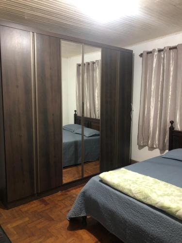 Voodi või voodid majutusasutuse Meire Gonçalves toas