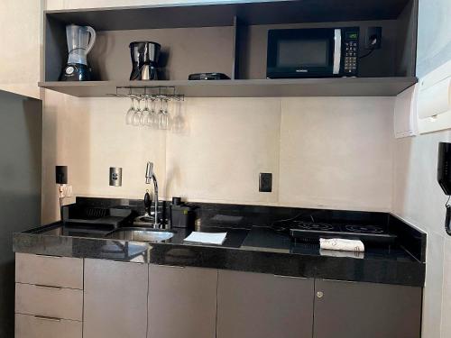 Η κουζίνα ή μικρή κουζίνα στο Flat Premium Quality CoHouse - Tambaú