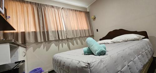 Ένα ή περισσότερα κρεβάτια σε δωμάτιο στο Whitehorse Inn