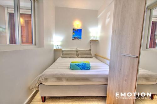Ένα ή περισσότερα κρεβάτια σε δωμάτιο στο Appartement 2 chambres Blue Marine Maho Sxm