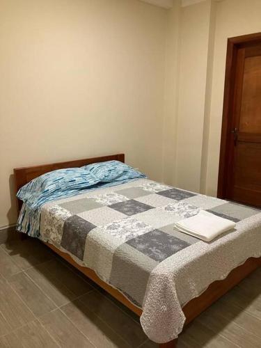 Ein Bett oder Betten in einem Zimmer der Unterkunft Mini departamento céntrico