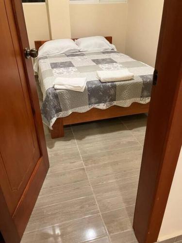 Ein Bett oder Betten in einem Zimmer der Unterkunft Mini departamento céntrico