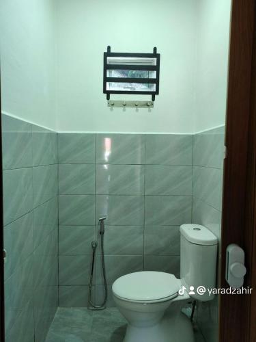 Ένα μπάνιο στο Homestay HABI Residence