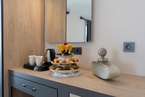 a bowl of fruit on a counter in a kitchen at IRENIC HOTEL in Antalya