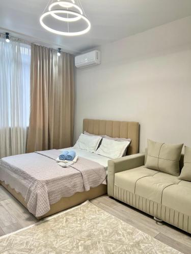 Llit o llits en una habitació de Open House Mega Park