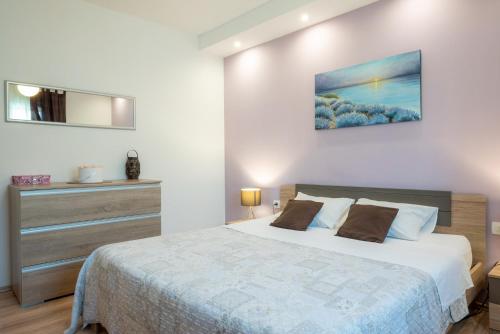 Katil atau katil-katil dalam bilik di Apartman Karlo Antonio