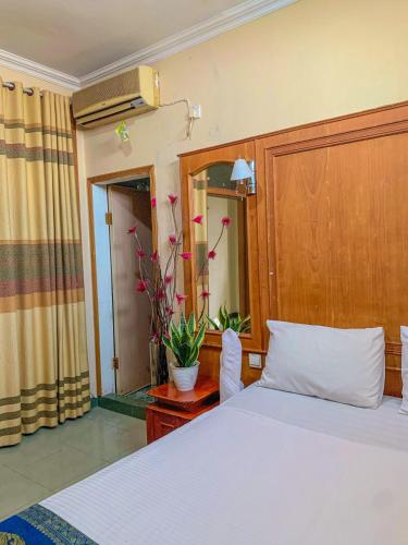 Ένα ή περισσότερα κρεβάτια σε δωμάτιο στο Rumah palala