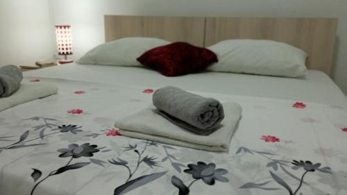 Katil atau katil-katil dalam bilik di Apartment Relax