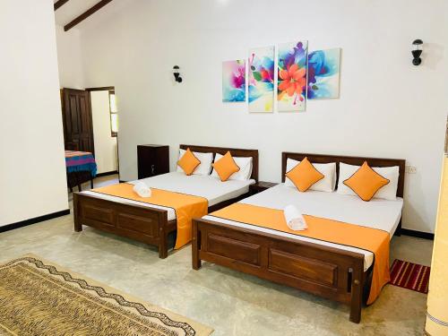 Postel nebo postele na pokoji v ubytování Silver Villa