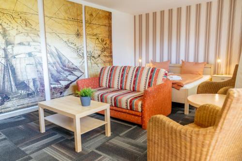 Posezení v ubytování Hotel dat Norden