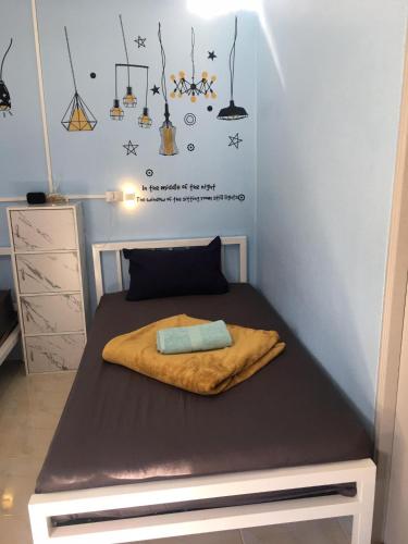 Ένα ή περισσότερα κρεβάτια σε δωμάτιο στο World Citizen GuestHouse