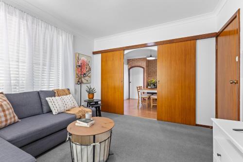 a living room with a couch and a table at Diamond Lake Escape in Collie