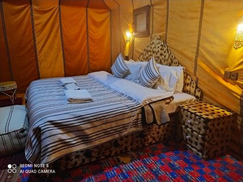 Ένα ή περισσότερα κρεβάτια σε δωμάτιο στο Desert Experience Glamping
