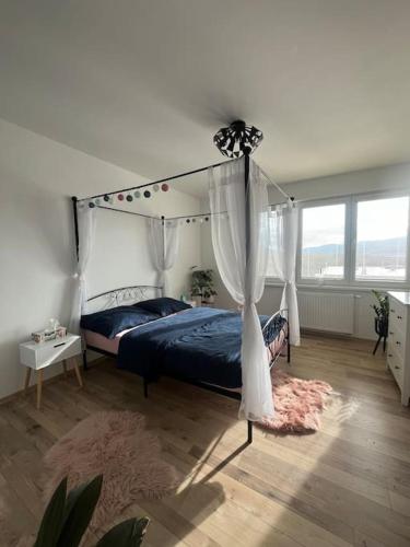 Posteľ alebo postele v izbe v ubytovaní Apartmán Marry