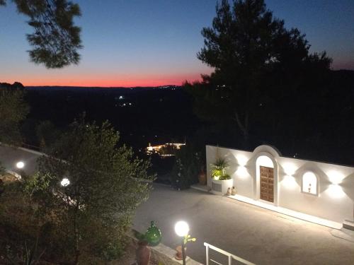 a view of a house at night with lights at Residence Maresol in Vieste
