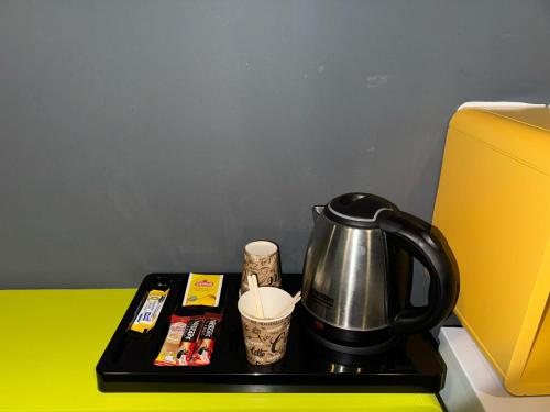 Aderans Hotelにあるコーヒーまたはお茶