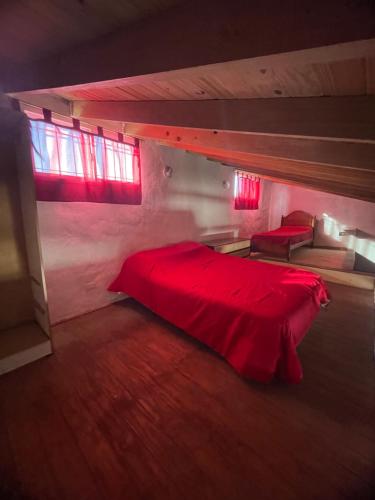 A bed or beds in a room at Casa en acantilados