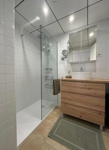 a bathroom with a shower and a sink at Casa Cristina, Corvera in Corvera