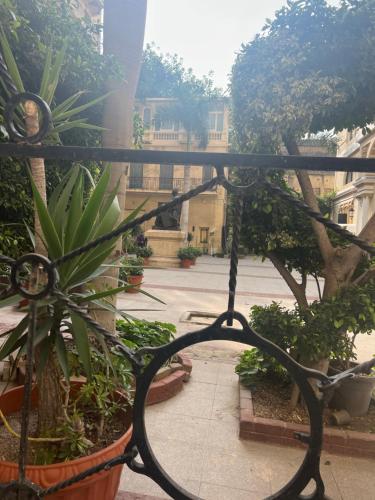 a view from a balcony of a courtyard with plants at زافيرو مسرح سيد درويش للعائلات فقط families only in Alexandria