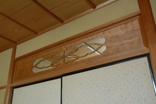 a sign on top of a door in a room at Sansuien in Yamaguchi