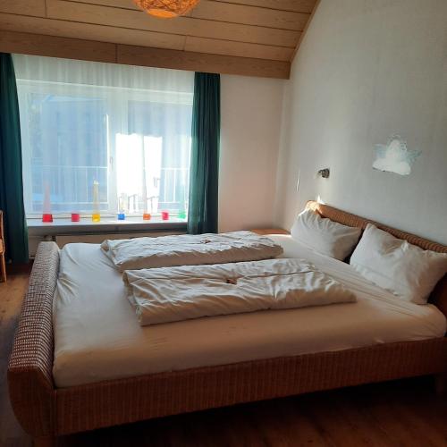 Ένα ή περισσότερα κρεβάτια σε δωμάτιο στο Ferienwohnung Jule