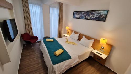 Postel nebo postele na pokoji v ubytování Jafar Resort 7