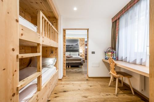 Una cama o camas en una habitación de Hotel Ravelli Luxury Spa