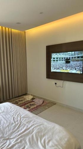 Una cama o camas en una habitación de شقق جادة قباء
