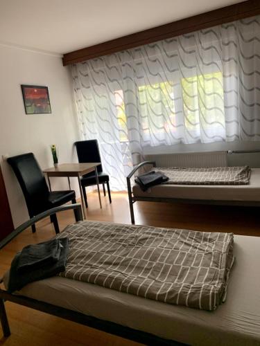Postel nebo postele na pokoji v ubytování Monteurzimmer - Karlsbad