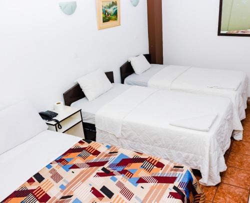 Katil atau katil-katil dalam bilik di Zentrico Hotel