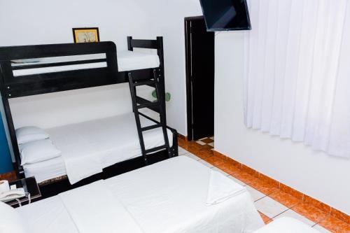Katil atau katil-katil dalam bilik di Zentrico Hotel