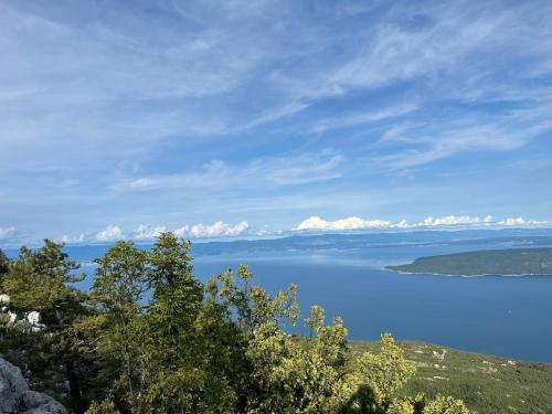 a view of a large body of blue water at Luxury Seaview Apartment in Juraši