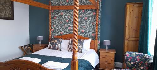 Ένα ή περισσότερα κρεβάτια σε δωμάτιο στο Waverley B & B