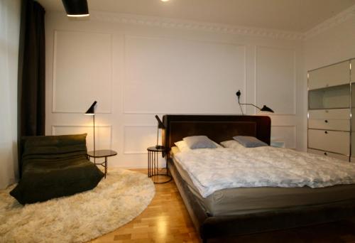 Cama o camas de una habitación en Zentrales hochwertiges Gründerzeit-Apartment Thomasius