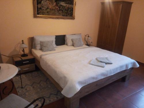 Posteľ alebo postele v izbe v ubytovaní Penzion Albatros