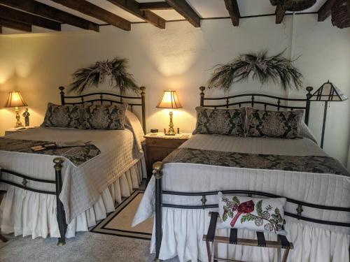 Katil atau katil-katil dalam bilik di The Richard Johnston Inn & 1890 Caroline House