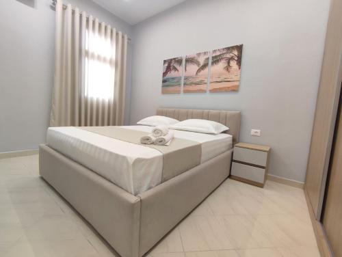 BP Beach Apartmentsにあるベッド