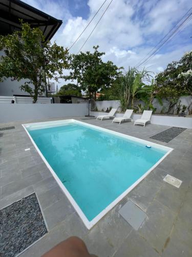 Der Swimmingpool an oder in der Nähe von L’oasis douceur