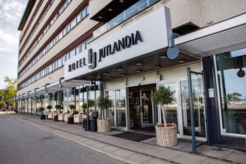 a store front of a building with a sign on it at Harbour Living by Jutlandia - Hostel Style in Frederikshavn