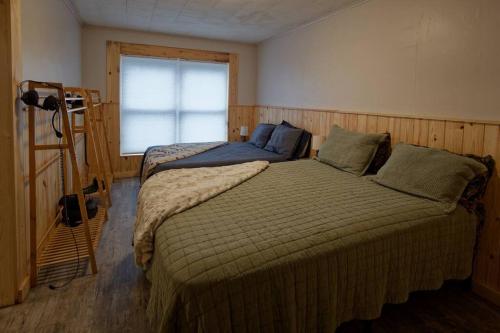 Postel nebo postele na pokoji v ubytování The Lodge at Welch
