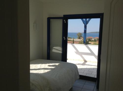 A bed or beds in a room at Villa Andrea