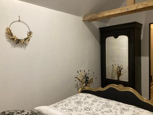 Cama o camas de una habitación en Gite de la Chapelle option SPA