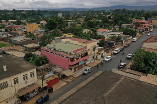 an overhead view of a city with cars parked on a street at Residencial Avenida Geovanni in São Tomé