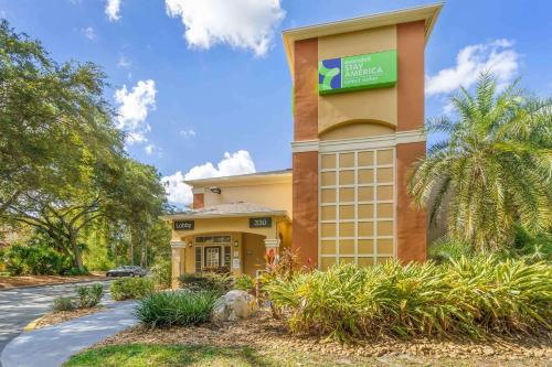 a hotel with a sign on the side of a building at Extended Stay America Select Suites - Tampa - Brandon in Brandon