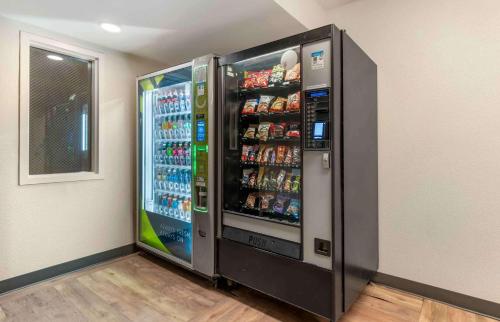 a refrigerator filled with lots of drinks in a room at Extended Stay America Premier Suites - Union City - Dyer St in Union City