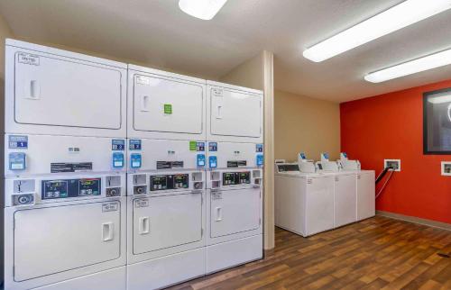 a room with a bunch of washers and dryers at Extended Stay America Select Suites - Tampa - Brandon in Brandon