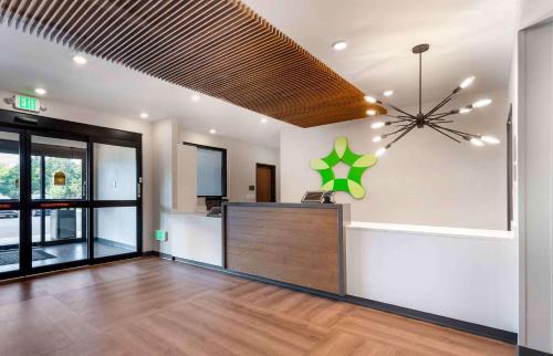 an empty lobby with a reception desk in a building at Extended Stay America Suites - Huntsville - Madison in Madison
