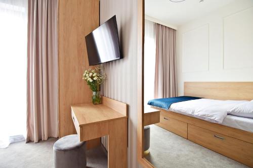 En eller flere senger på et rom på IVY Healthy Stay
